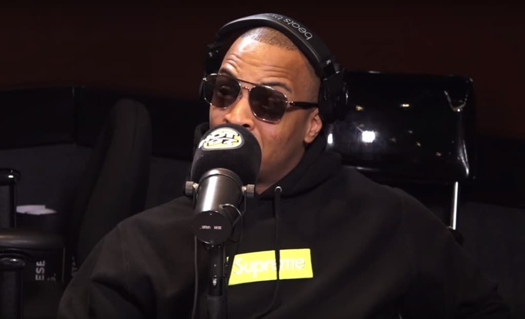Watch T.I. Talks Meeting Kanye West, Trap Music, Gun Laws, Tiny & More with Ebro on Hot 97