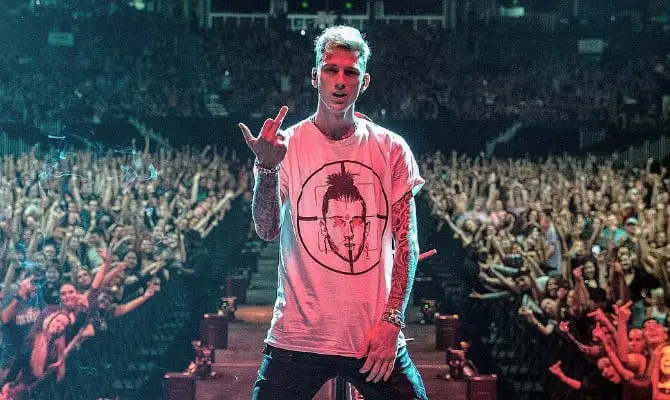 MGK Exposed for Faking Pictures & Getting Booed on Stage while Performing 'Rap Devil'