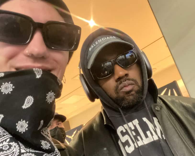 Fans React After Kanye West Was Spotted Boarding A Commercial Flight